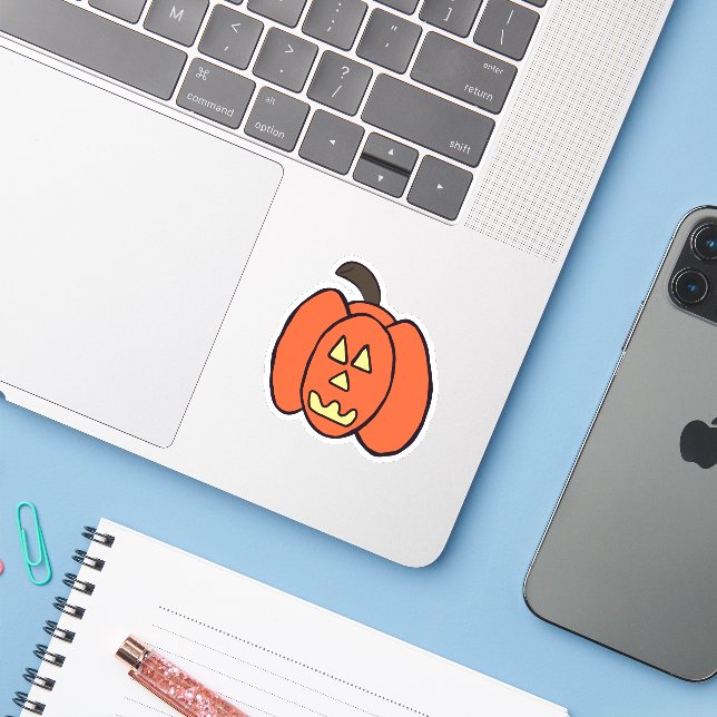 Spooky Halloween-Kürbislaterne Aufkleber (Laptop mit iPhone)