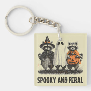 Spooky und Feral Halloween Niedlicher Geisterracco Schlüsselanhänger