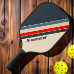 Sport Retro Nautical Rainbow Streifen mit Namen Pickleball Schläger<br><div class="desc">Das Sport Retro Nautical Rainbow Striped Pickleball Paddle with Name bringt lebendige Energie in jedes Spiel mit seinem kühnen Regenbogenstreifen Design, inspiriert durch klassische nautische Themen. Dieses Paddel ist ideal für Spieler, die gewollt haben, ihre Persönlichkeit und ihren Flair auf dem Platz zu präsentieren. Fügen Sie Ihren Namen für eine...</div>