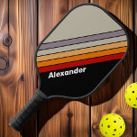 Sport Retro Vibe Regenbogen Streifen mit Namen Pickleball Schläger<br><div class="desc">Machen Sie mit dem Sport Retro Vibe Rainbow Striping mit Name Pickleball Paddle eine kühne Aussage auf dem Platz. Dieses Paddel mit seinem lebendigen, regenbogengestreiften Design verleiht jedem Spiel einen unterhaltsamen und dynamischen Flair. Es ist individuell auf Ihren Namen zugeschnitten und ist eine einzigartige Möglichkeit, Ihre Persönlichkeit zu zeigen, während...</div>