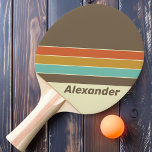 Sport Vintag Retro Regenbogen Streifen mit Namen Tischtennis Schläger<br><div class="desc">Das Sport Vintag Retro Rainbow Striped Pong Paddle fügt Ihrem Spiel einen lebendigen, nostalgischen Flair hinzu. Mit einem kühnen Regenbogendesign bringt dieses Paddel jedem Streichholz eine spielerische Retro-Energie. Personalisieren Sie es mit Ihrem Namen, um es wirklich zu Ihrem und stehen Sie auf dem Tisch. Egal ob Sie ein lässiger Spieler...</div>