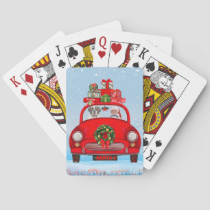 St. Bernhardshund im Auto mit dem Weihnachtsmann Spielkarten