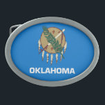 STAAT OKLAHOMA FLAG OVALE GÜRTELSCHNALLE<br><div class="desc">Die Oklahoma-Staatsflagge besteht aus einem traditionellen Büffelhaut-Schild der Osage Nation mit sieben Adlerfedern auf einem Himmelsblau-Feld der Choctaw.</div>