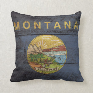 Staatsflagge von Montana auf Altholzkörnern Kissen