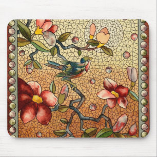 Stained glass style bird on a flowering tree mousepad