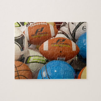 Stapel des Sport-Ball-Puzzlen