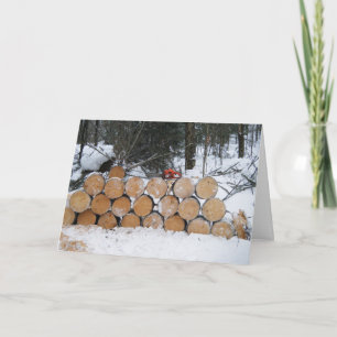 Stapel geschnittener Holzstämme Karte