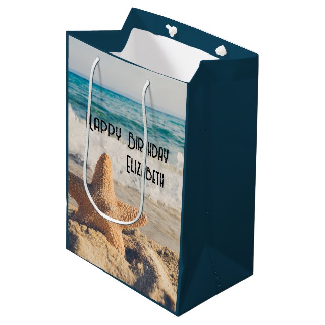 Starfish auf einem Sandy Beach Foto Mittlere Geschenktüte (Vorderseite Schrägansicht)