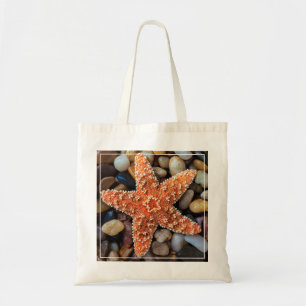 Starfish auf Felsen Tragetasche