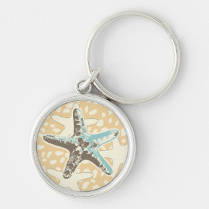 Starfish im Sand Schlüsselanhänger