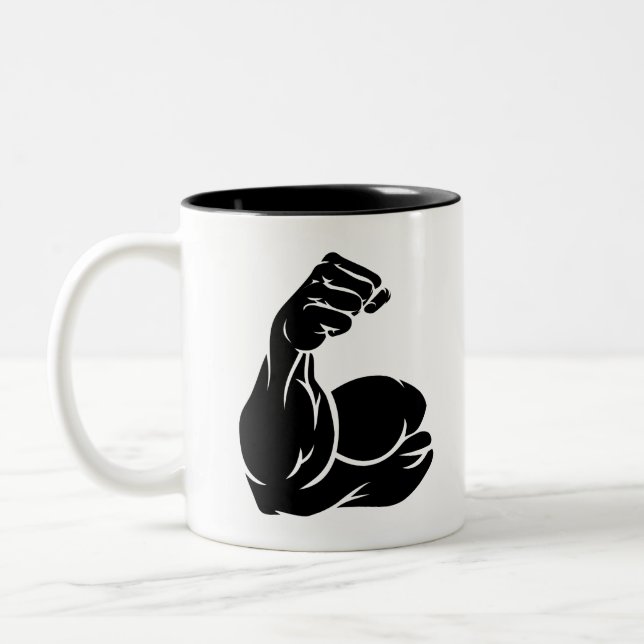 Starker Arm zeigt Biceps Zweifarbige Tasse (Links)
