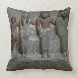 Statuette einer Familiengruppe (Pigment auf Kissen