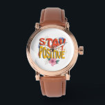 Stay Positive – Floral Motivational  Armbanduhr<br><div class="desc">Brighten your day with this uplifting design! The bold phrase STAY POSITIVE is highlighted with vibrant colors and surrounded by cheerful floral elements,  making it a perfect reminder to embrace optimism and good vibes. Ideal for casual wear,  workouts,  or as a thoughtful gift to inspire positivity.</div>