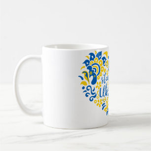 Stehen Sie mit ukrainischer Schrift und Herz Kaffeetasse