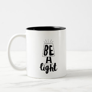 Stellen Sie Niedliche Grafikstipps ein, um zu ermu Zweifarbige Tasse