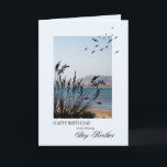 Step BotherBirthday, Seaside Scene Karte<br><div class="desc">Eine schöne Geburtstagskarte für einen Schrittbruder. Eine Szene am Meer mit Silhouette Gras und Möwen. Eine schöne ruhige Umgebung,  um Erinnerungen von Badeferien zu fördern.</div>