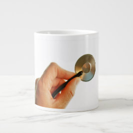 Stethoscoop in een hand voor een ziekenhuis sfeer. Jumbo-Tasse