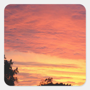 Sticker Carré Coucher de soleil clair et nuageux orange,