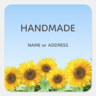 Sticker Carré Fleurs de soleil et texte artisanal sur bleu clair
