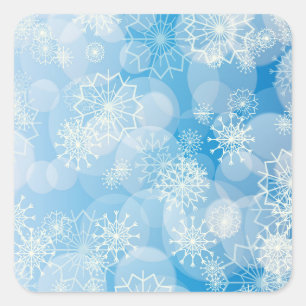 Sticker Carré Flocons de Noël sur un fond bleu         
