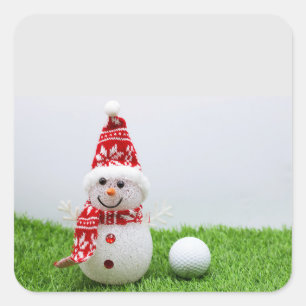 Sticker Carré Golfer Snowman avec balle de golf pendant les vaca