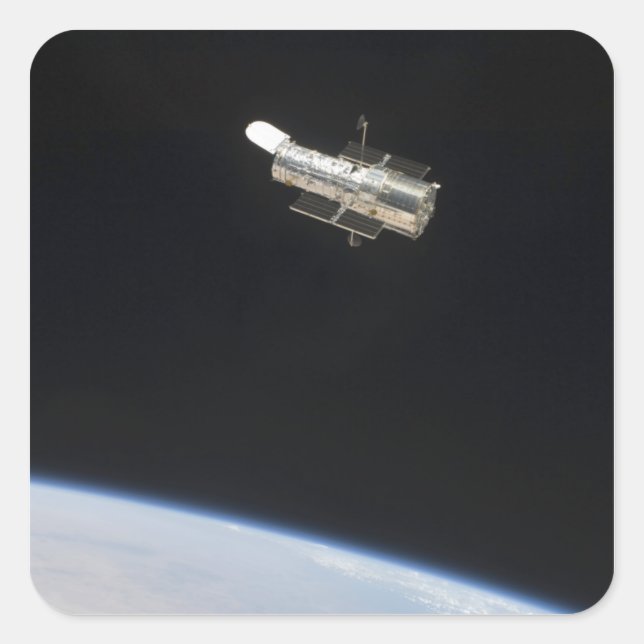 Sticker Carré Le télescope spatial Hubble en orbite au-dessus de (Devant)