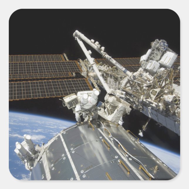 Sticker Carré Les astronautes effectuent une série de tâches (Devant)
