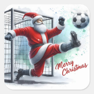 Sticker Carré Père Noël jouant au football dans la neige