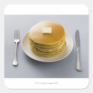 Sticker Carré Pile de crêpes avec du beurre d'un plat