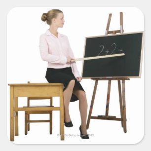 Sticker Carré Règle de pointage d'enseignant féminine au tableau