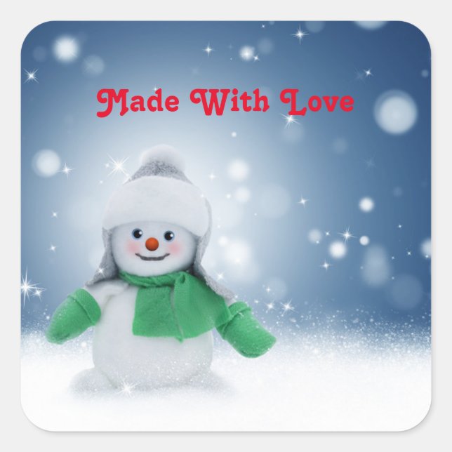 Sticker Carré Snowman avec une écharpe verte (Devant)