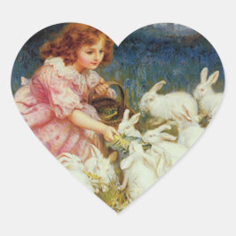 Sticker Cœur Fille nourrissant des lapins