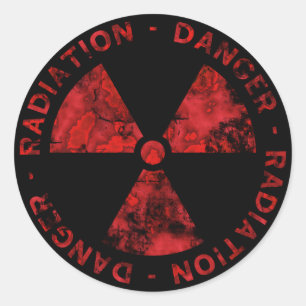 Sticker du symbole de rayonnement rouge en détress