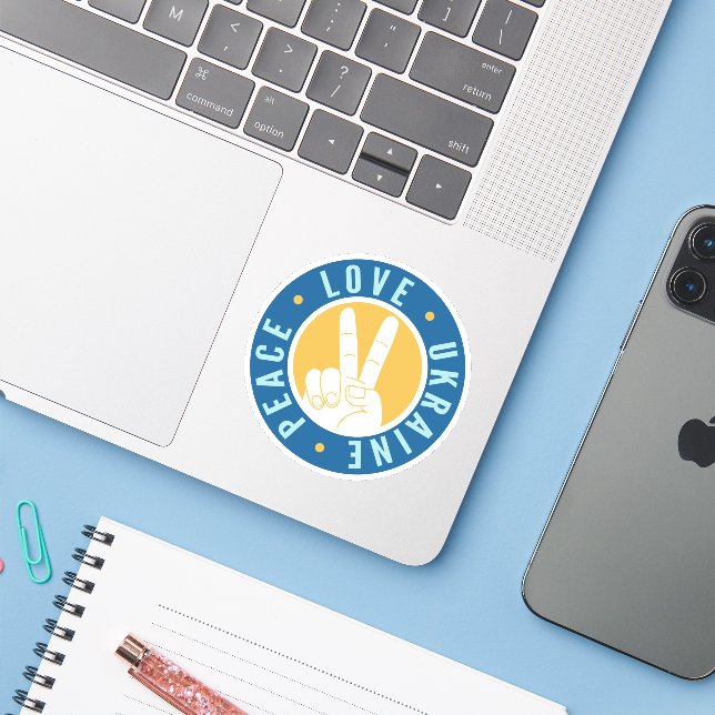 Sticker L'amour pour la paix en Ukraine (Ordinateur portable avec iPhone)