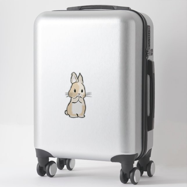 Sticker Lapin qui se lave (Sur valise)