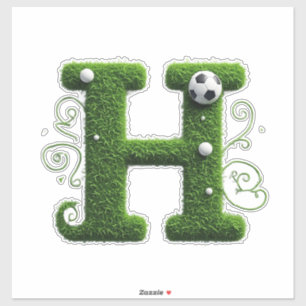 Sticker Lettre H avec ballon de football sur herbe verte