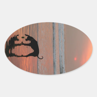 Sticker Ovale Coucher de soleil de chien