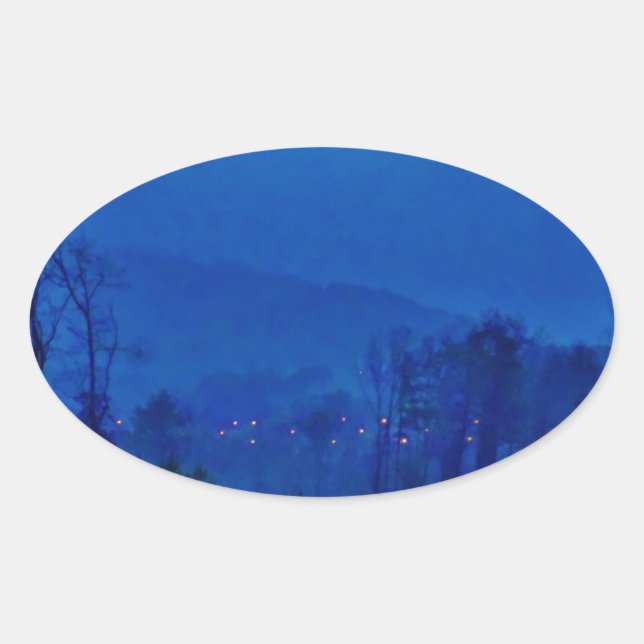 Sticker Ovale Des lumières scintillantes dans un Blue Mountain M (Devant)