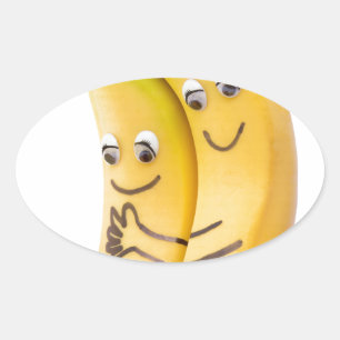 Sticker Ovale Deux bananes aimantes avec les yeux et la bouche