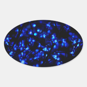 Sticker Ovale Joli feu de fleurs bleues