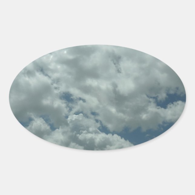 Sticker Ovale Nuages blancs et moelleux dans le ciel bleu (Devant)