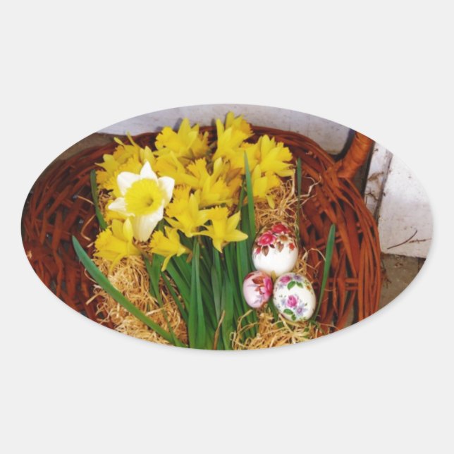 Sticker Ovale Un panier de jonquilles jaunes et d'oeufs de Pâque (Devant)