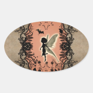 Sticker Ovale Une jolie silhouette de fée avec brillance,