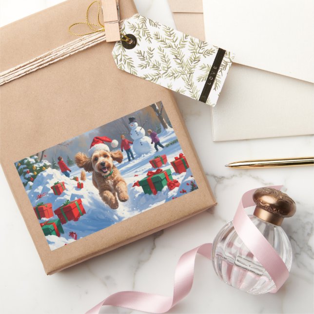 Sticker Rectangulaire Cockapo coule en neige avec Casquette de Noël (Cadeaux)