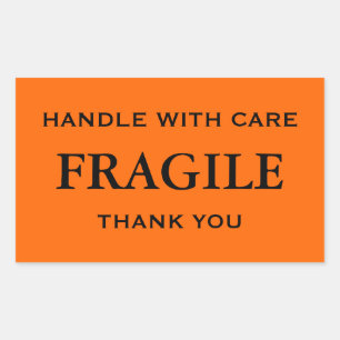 Sticker Rectangulaire Fragile orange/noir. Manipuler avec soin. Merci.