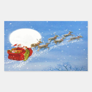 Sticker Rectangulaire père Noël avec son Reindeer volant