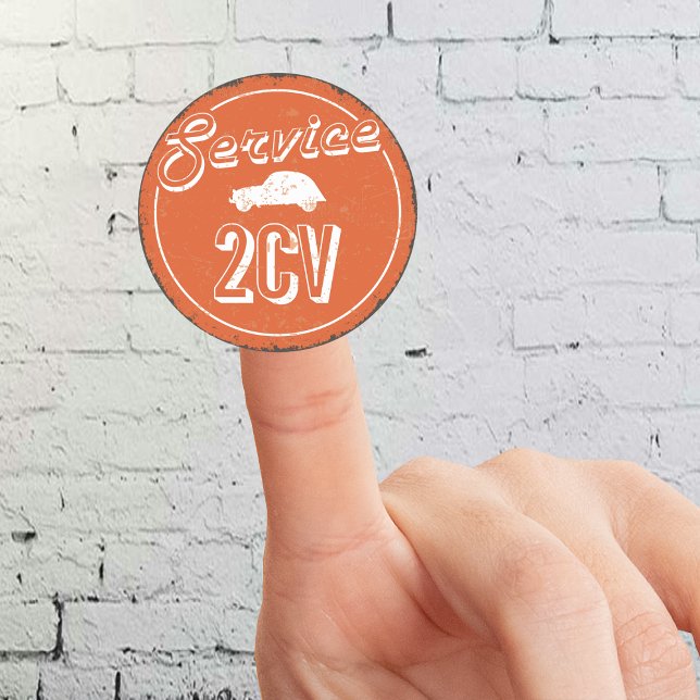 Sticker Rond 2CV Service Vintage (2CV Round Sticker in Orange with a White Vintage Text and Deux Chevaux Illustration)