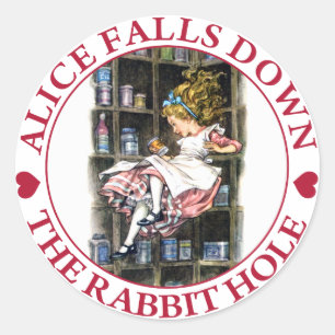 STICKER ROND ALICE TOMBE VERS LE BAS LE TERRIER DE LAPIN