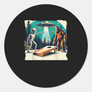 Sticker Rond Amusant Alien Jouer cornhole Bigfoot et UFO