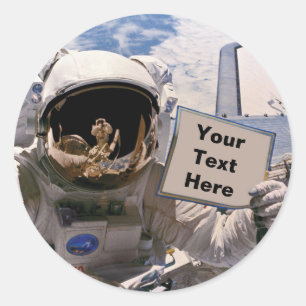 Sticker Rond Astronaute de la NASA tenant un panneau - Ajouter 